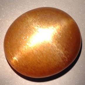 Piedra sol estrella marrón dorado natural de 23,28 ct, corte óvalo, opaco
