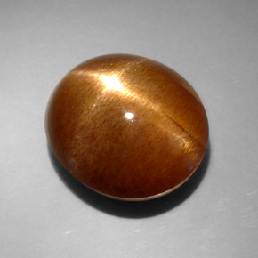 Piedra sol estrella marrón natural de 14,95 ct, corte óvalo, opaco