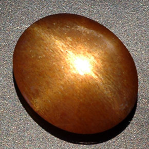 Piedra sol estrella marrón natural de 8,09 ct, corte óvalo, opaco