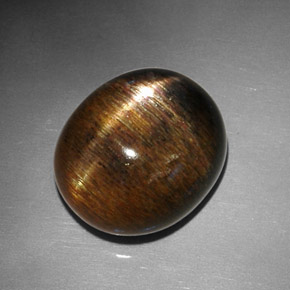 Piedra sol estrella marrón natural de 12,68 ct, corte óvalo, opaco