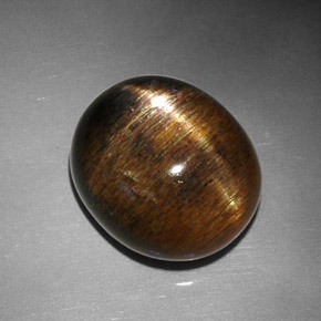 Piedra sol estrella marrón natural de 12,68 ct, corte óvalo, opaco