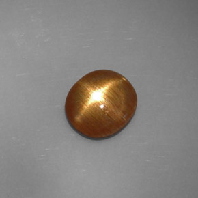 Piedra sol estrella marrón dorado natural de 1,32 ct, corte óvalo, opaco