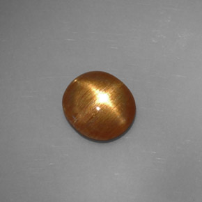 Piedra sol estrella marrón dorado natural de 1,32 ct, corte óvalo, opaco