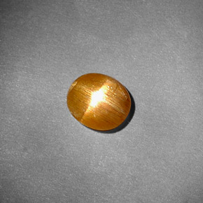 Piedra sol estrella marrón natural de 0,81 ct, corte óvalo, opaco