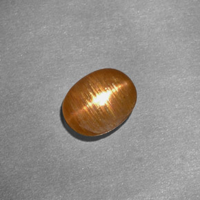 Piedra sol estrella marrón natural de 1,01 ct, corte óvalo, opaco