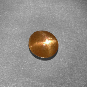 Piedra sol estrella marrón natural de 0,79 ct, corte óvalo, opaco