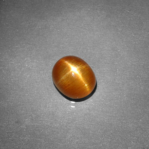 Piedra sol estrella marrón dorado natural de 1,49 ct, corte óvalo, opaco