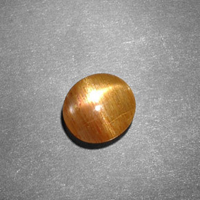 Piedra sol estrella marrón natural de 0,99 ct, corte óvalo, opaco