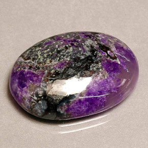 Sugilita multicolor natural de 16,51 ct, corte óvalo, opaco