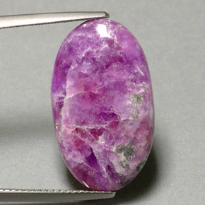 Sugilita multicolor natural de 11,75 ct, corte óvalo, opaco