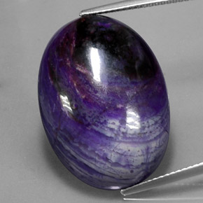 Sugilita multicolor natural de 27,34 ct, corte óvalo, opaco