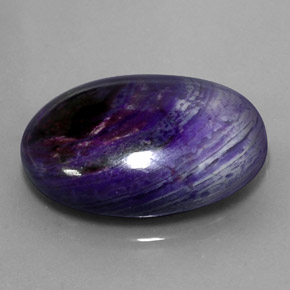 Sugilita multicolor natural de 27,34 ct, corte óvalo, opaco