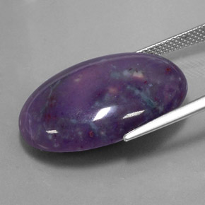Sugilita multicolor natural de 22,62 ct, corte óvalo, opaco