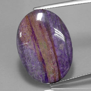 Sugilita multicolor natural de 12,41 ct, corte óvalo, opaco