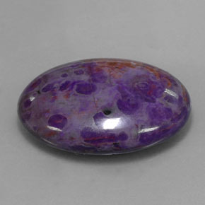 Sugilita multicolor natural de 21,13 ct, corte óvalo, opaco