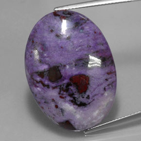 Sugilita multicolor natural de 29,30 ct, corte óvalo, opaco