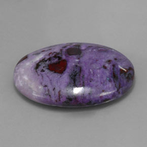 Sugilita multicolor natural de 29,30 ct, corte óvalo, opaco