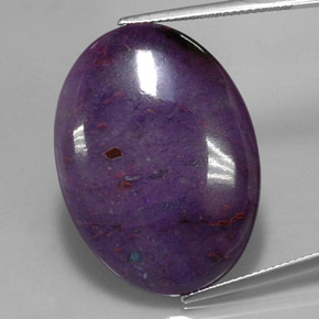 Sugilita multicolor natural de 25,71 ct, corte óvalo, opaco