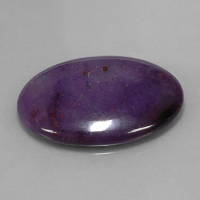 Sugilita multicolor natural de 25,71 ct, corte óvalo, opaco