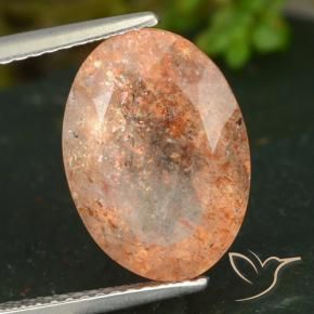 Piedrasol Naranja claro natural de 5.89 ct, Ovalada, Translúcido