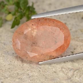 Piedrasol Naranja rojizo natural de 5.97 ct, Ovalada, Translúcido
