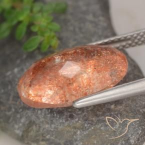 Piedrasol Naranja rojizo natural de 4.88 ct, Ovalada, Translúcido