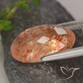 Piedrasol Naranja jengibre natural de 5.31 ct, Ovalada, Transparente