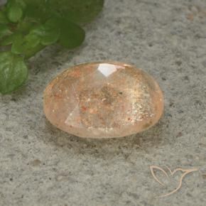 Piedrasol Naranja durazno claro natural de 4.98 ct, Ovalada, Translúcido