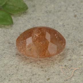 Piedrasol Naranja rojizo natural de 4.34 ct, Ovalada, Translúcido