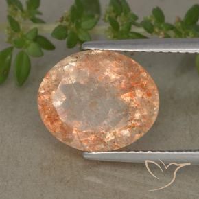 Piedrasol Naranja claro natural de 4.83 ct, Ovalada, Translúcido