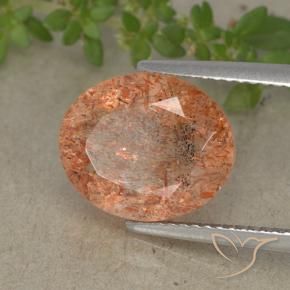 Piedrasol Naranja claro medio natural de 4.87 ct, Ovalada, Translúcido