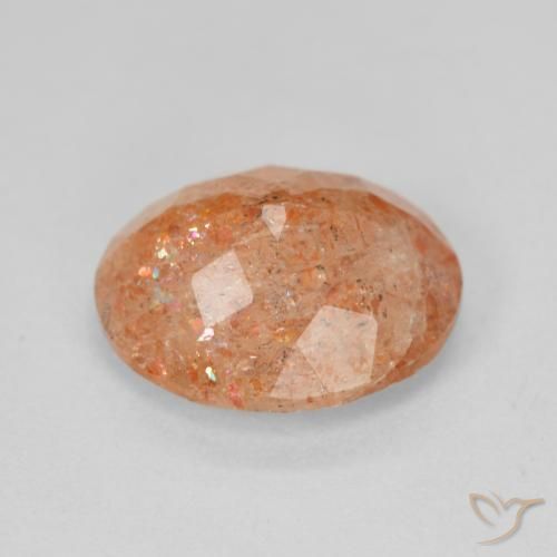 Piedrasol Naranja rojizo natural de 4.02 ct, Ovalada, Translúcido