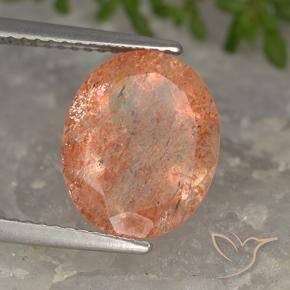 Piedrasol Naranja claro natural de 4.19 ct, Ovalada, Translúcido