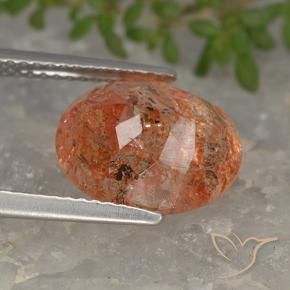 Piedrasol Naranja rojizo natural de 4.24 ct, Ovalada, Translúcido