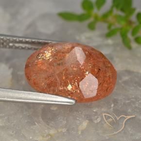 Piedrasol Naranja rojizo natural de 4.54 ct, Ovalada, Translúcido