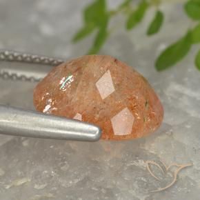Piedrasol Naranja rojizo natural de 4.32 ct, Ovalada, Translúcido