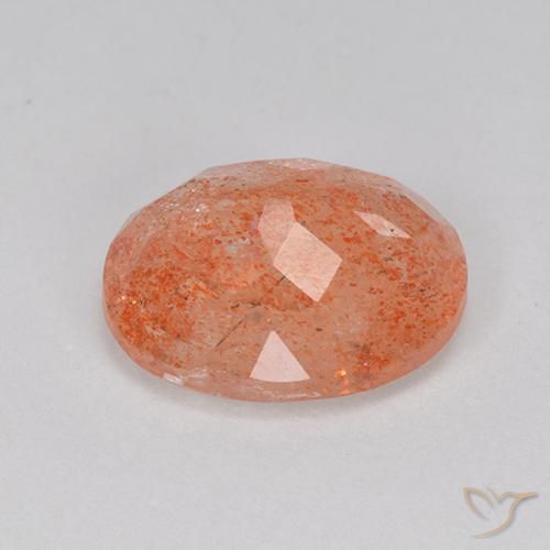 Piedrasol Rojo naranja claro natural de 3.33 ct, Ovalada, Translúcido