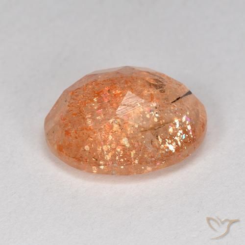 Piedrasol Naranja claro natural de 3.73 ct, Ovalada, Translúcido