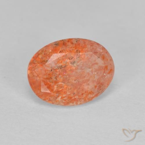 Piedrasol Naranja rojizo natural de 1.26 ct, Ovalada, Translúcido