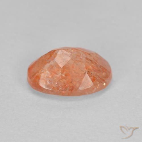 Piedrasol Naranja rojizo natural de 1.26 ct, Ovalada, Translúcido