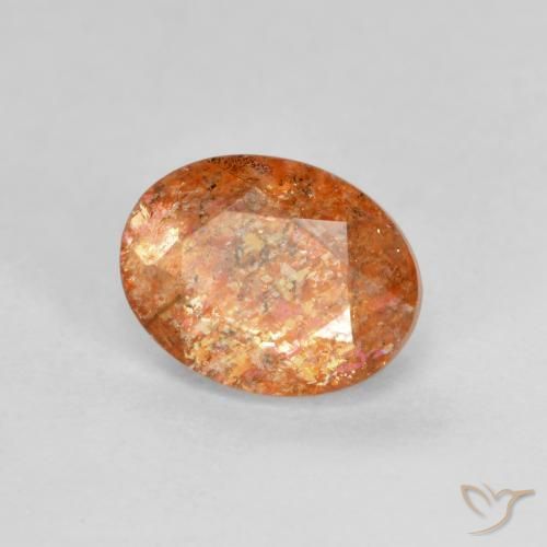 Piedrasol Naranja rojizo natural de 1.31 ct, Ovalada, Translúcido