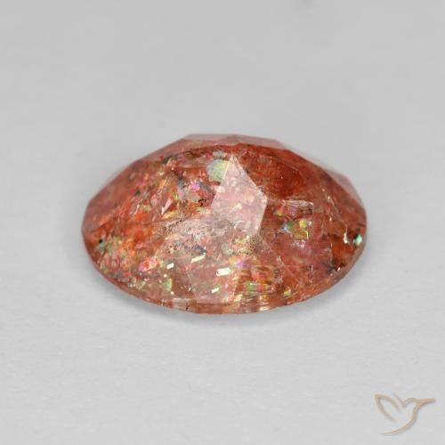 Piedrasol Naranja rojizo natural de 2.80 ct, Ovalada, Transparente