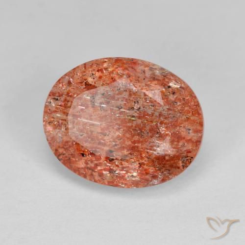 Piedrasol Naranja cálido natural de 3.47 ct, Ovalada, Transparente