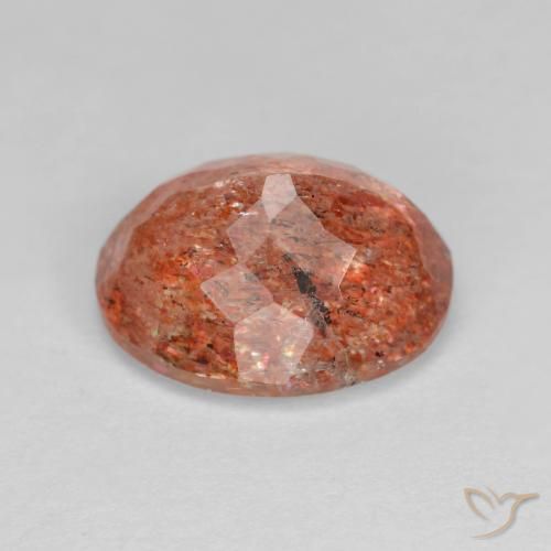 Piedrasol Naranja cálido natural de 3.47 ct, Ovalada, Transparente