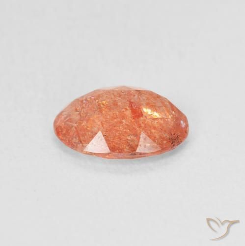 Piedrasol Naranja claro natural de 0.92 ct, Ovalada, Translúcido