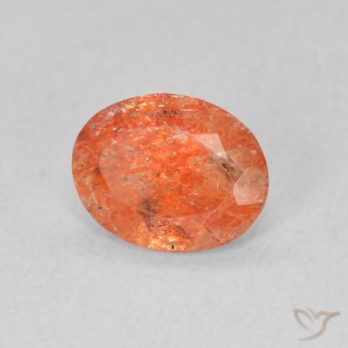 Piedrasol Naranja claro natural de 0.94 ct, Ovalada, Translúcido