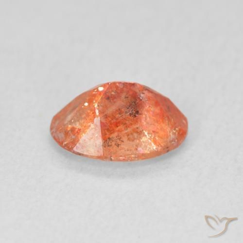 Piedrasol Naranja claro natural de 0.94 ct, Ovalada, Translúcido