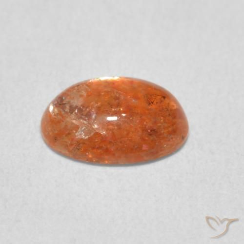 Piedrasol Naranja rojizo natural de 1.08 ct, Ovalada, Translúcido
