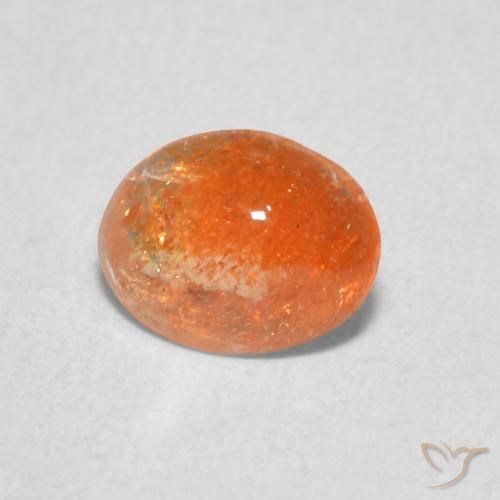 Piedrasol Naranja oscuro natural de 0.77 ct, Ovalada, Translúcido