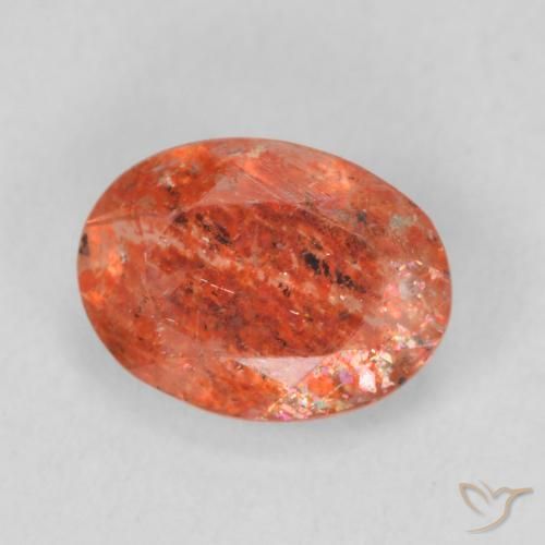 Piedrasol Ámbar naranja natural de 1.03 ct, Ovalada, Translúcido